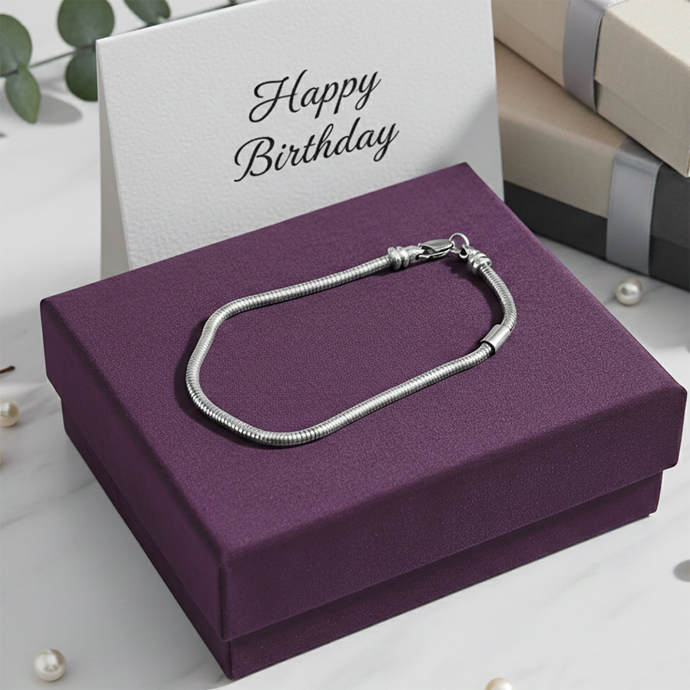 Belle Fever Moments bracelet displayed in gift box, timeless starter base for charms, meaningful jewelry gift for her.