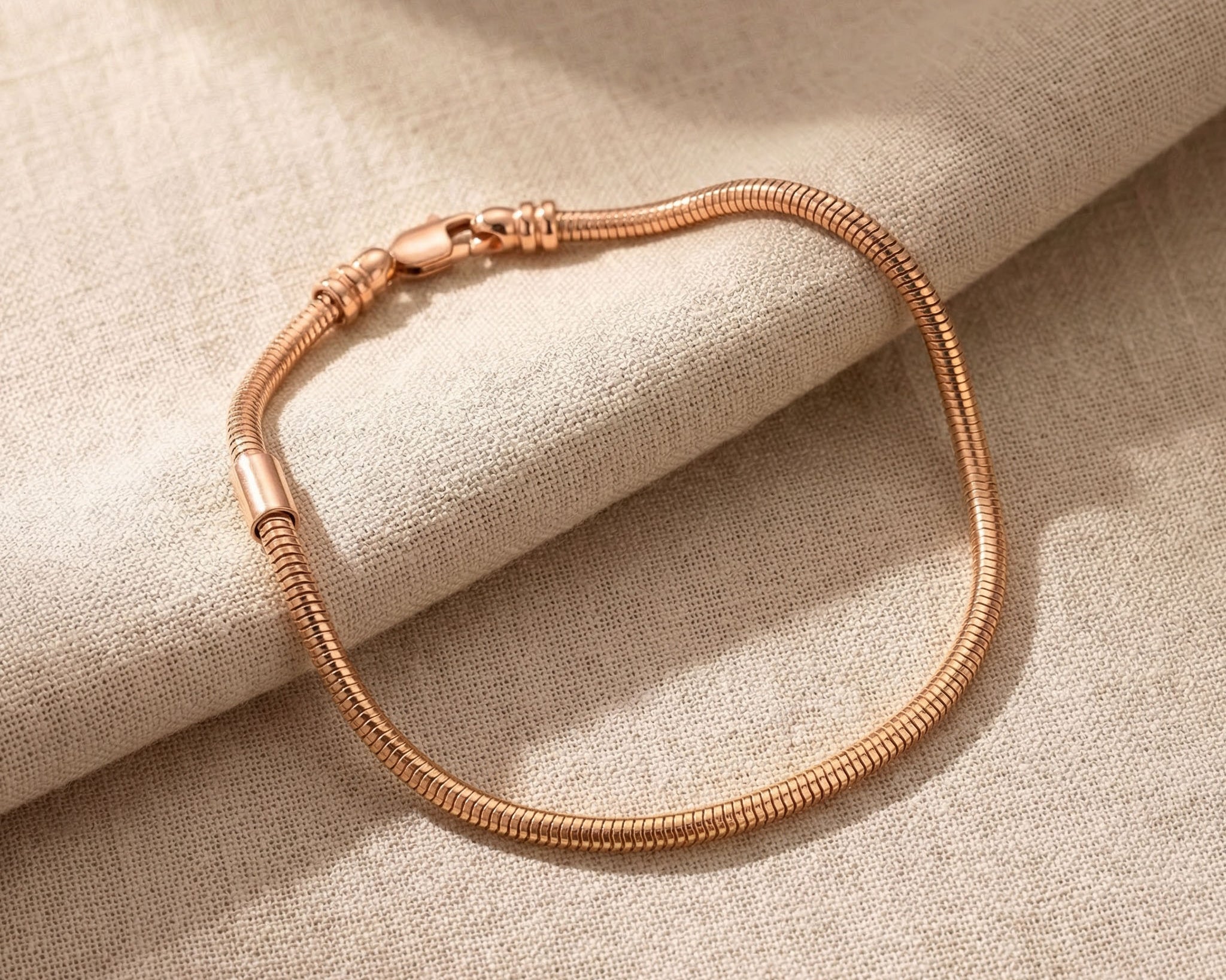 Moments charm bracelet in rose gold with interchangeable charms, personalised jewellery design