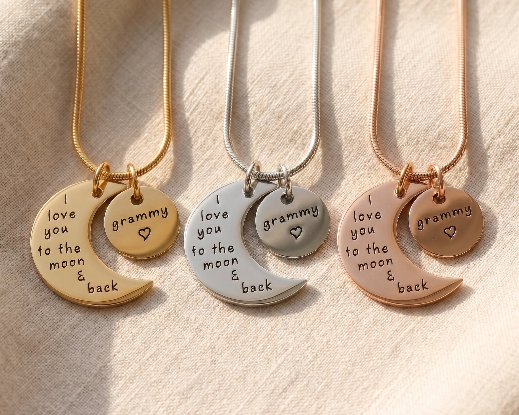 Moon and back necklace tone comparison showing gold, silver and rose gold engraved keepsake designs