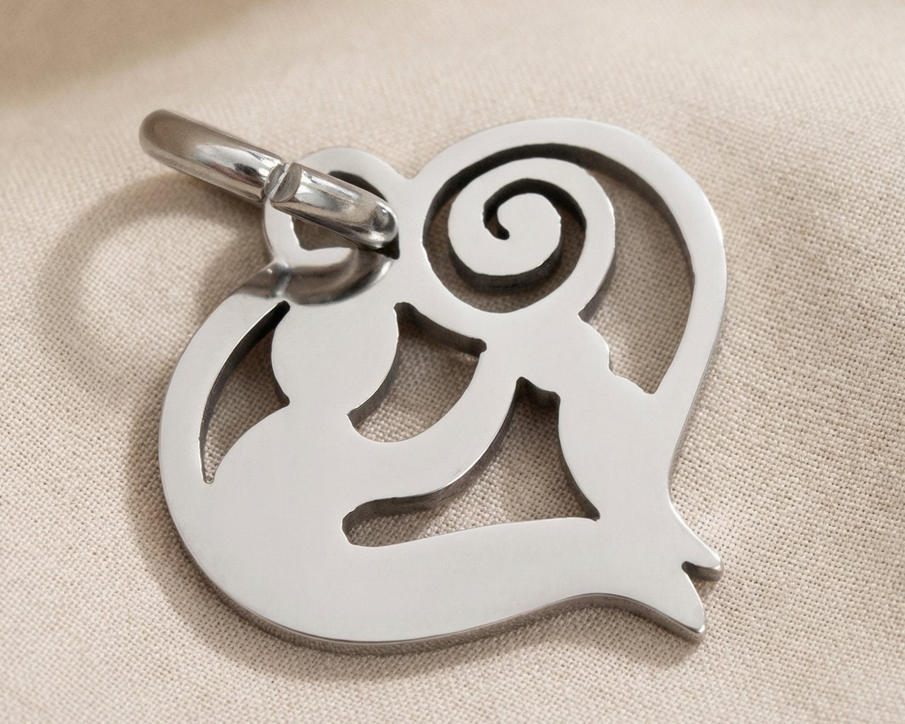 Silver mother and child charm for keyring symbolizing motherhood, unconditional love, and family connection