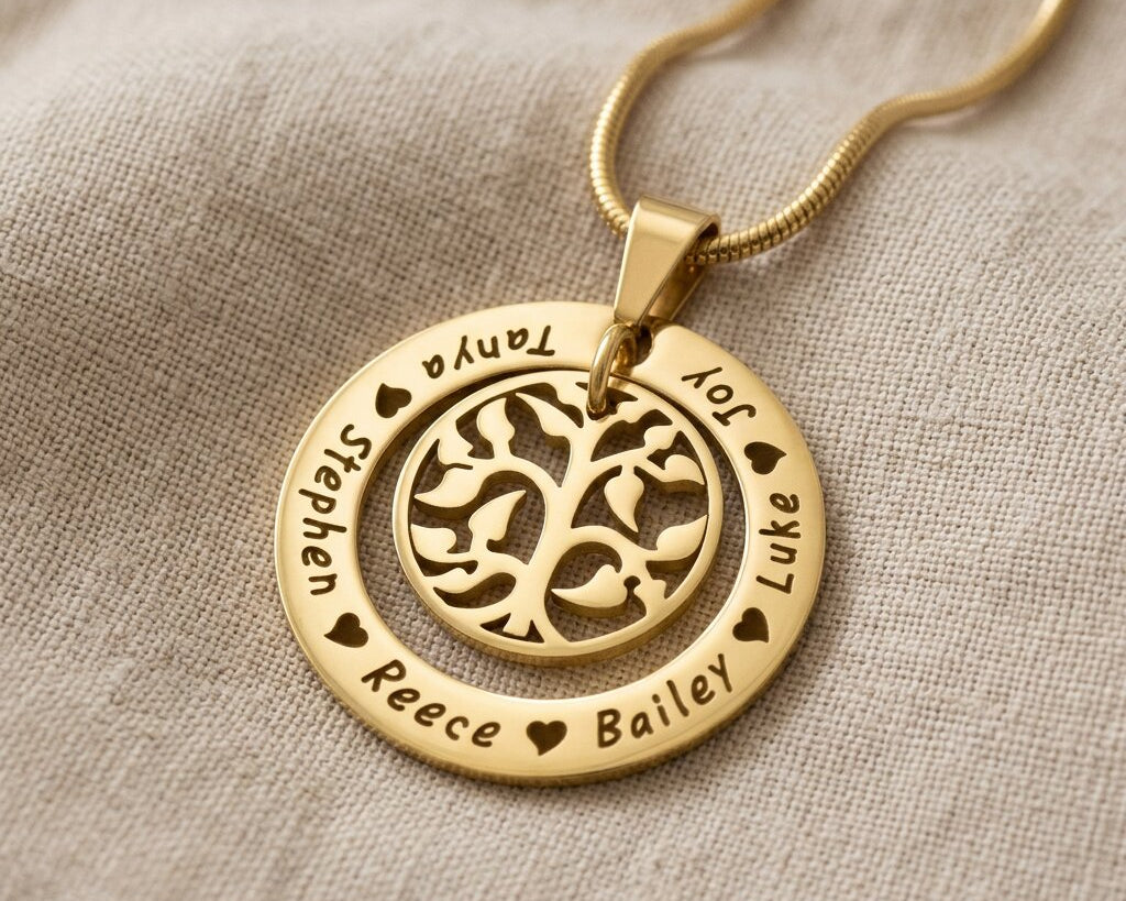 Gold My Family Tree necklace with circular tree of life pendant displayed on neutral background