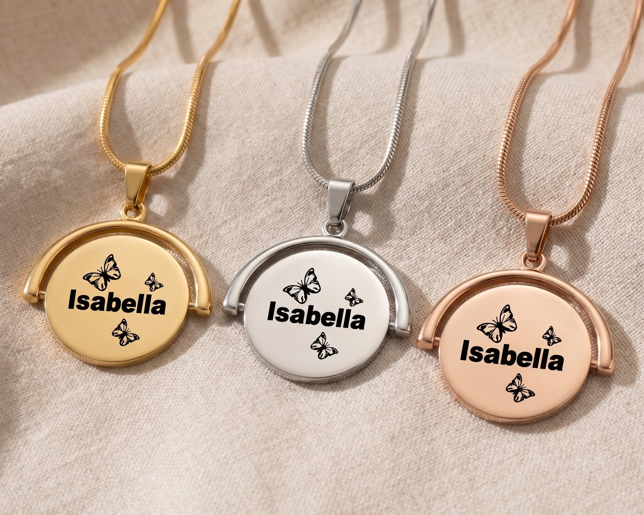 Spinning name necklace tone comparison showing gold, silver and rose gold personalised finishes