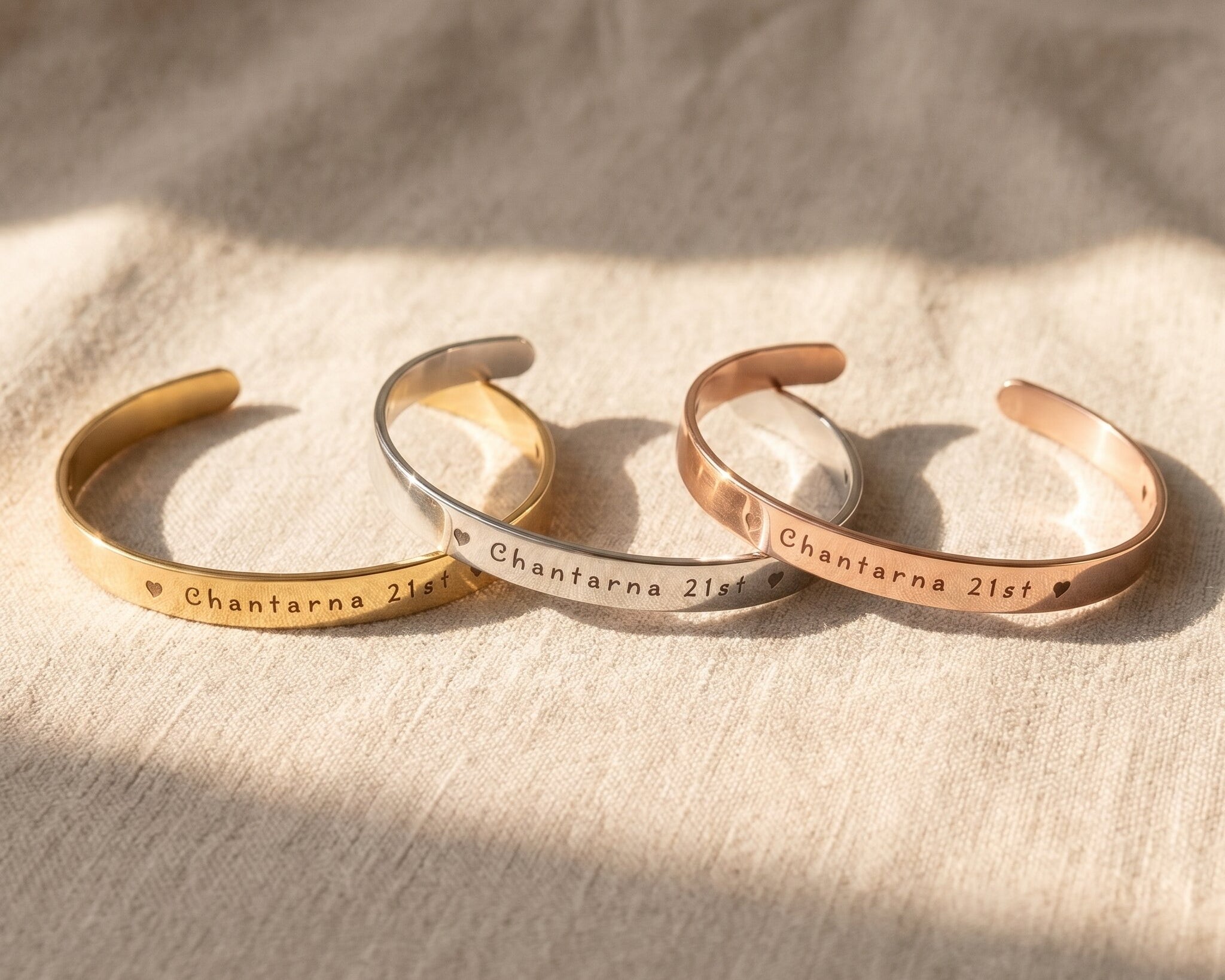 Open cuff bangle tone comparison showing gold, silver and rose gold engraved jewellery finishes