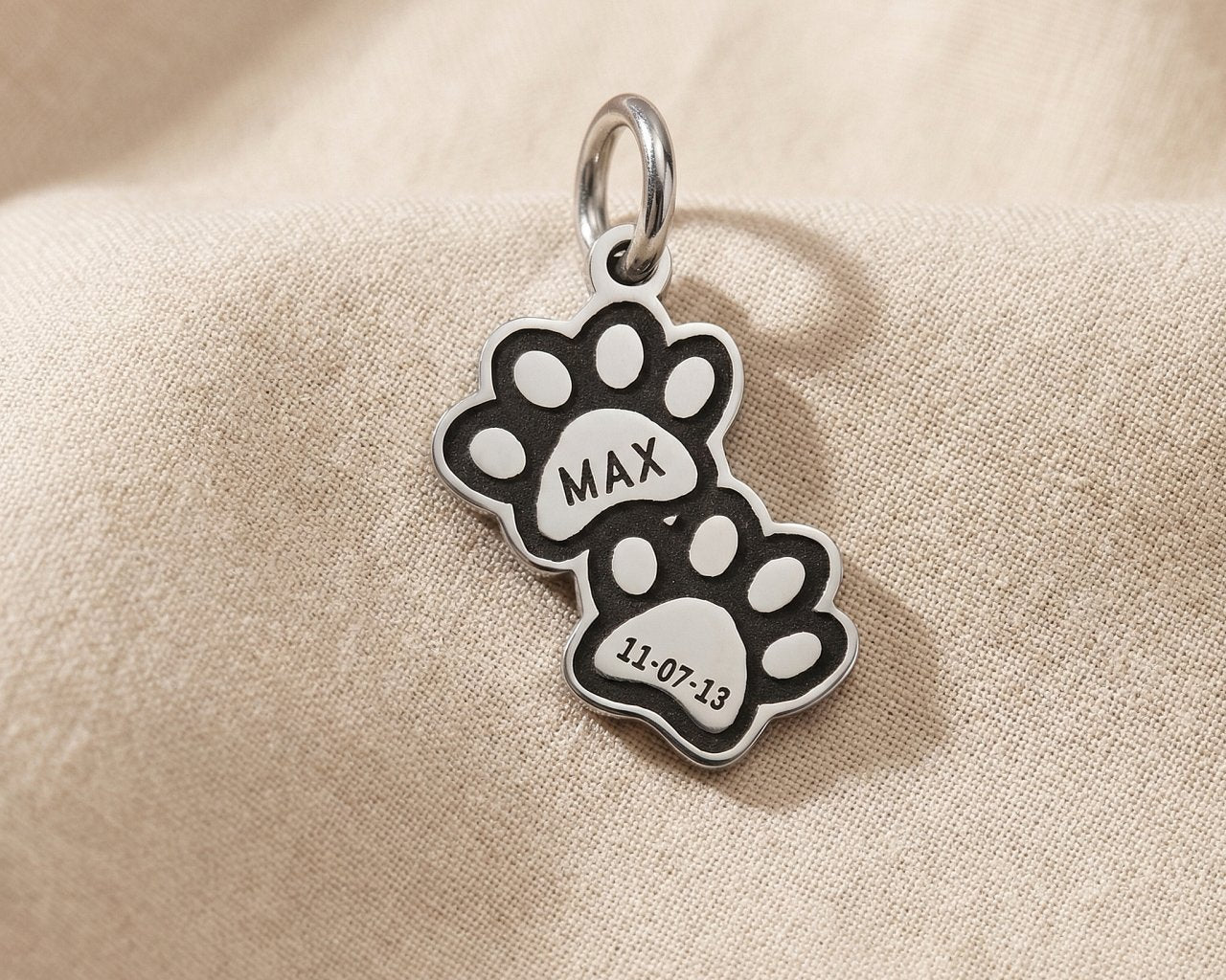 Double paw print charm for keyring designed for pet lovers and memorial keepsake memories