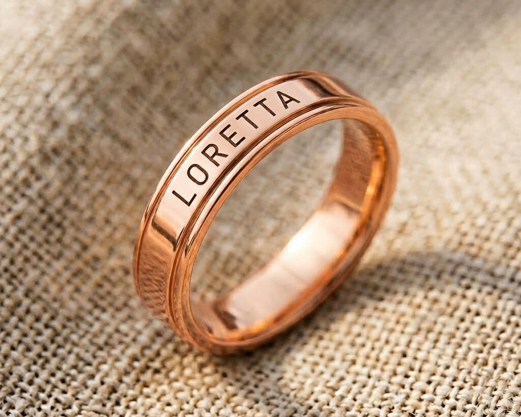 Rose gold personalised band ring with engraved name detail, elegant custom jewelry piece