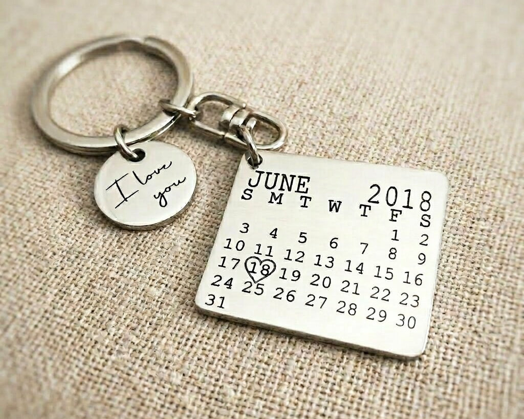 Silver personalised calendar keyring with engraved date calendar tag design
