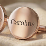 Close-up of Personalised cufflinks with engraved message on round surface