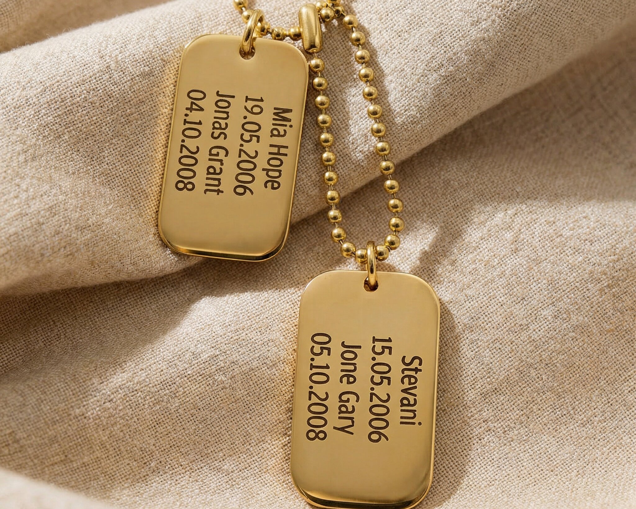 Double personalised dog tag necklace with engraved text showing layered tag design option