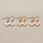Personalised earrings showing heart shape options with engraved name customization