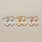 Personalised earrings showing heart shape options with engraved name customization