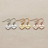Personalised earrings showing heart shape options with engraved name customization