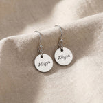 Silver personalised earrings with engraved name on disc design