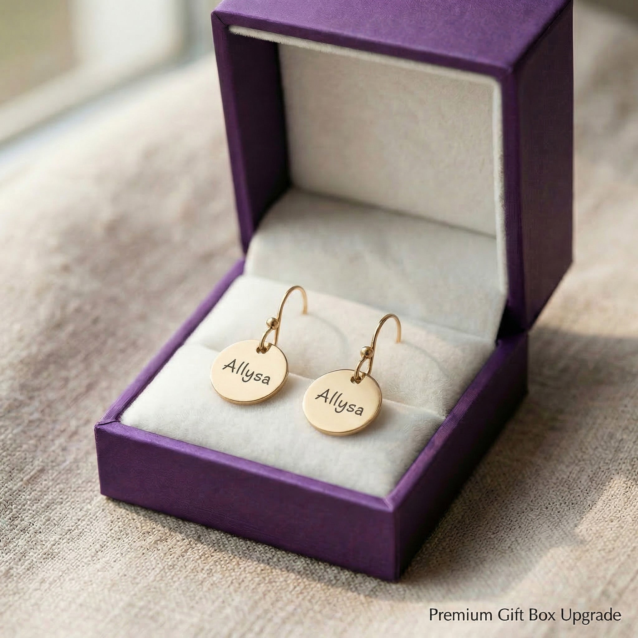 Personalised disc earrings presented in elegant jewelry gift box packaging