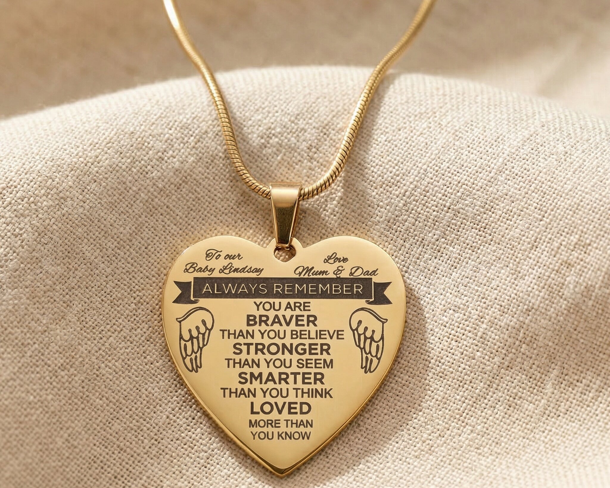 Personalised heart necklace in gold with engraved message, meaningful keepsake jewellery