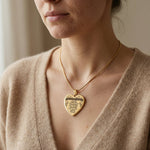 Woman wearing personalised heart necklace with engraved quote, everyday sentimental jewellery