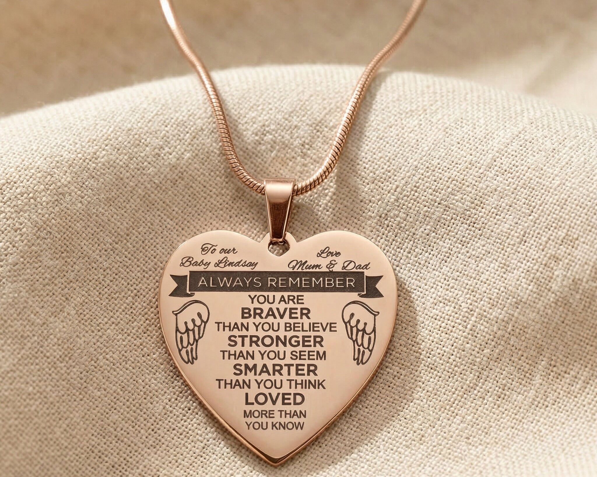 Personalised heart necklace in rose gold with engraved message, elegant keepsake design