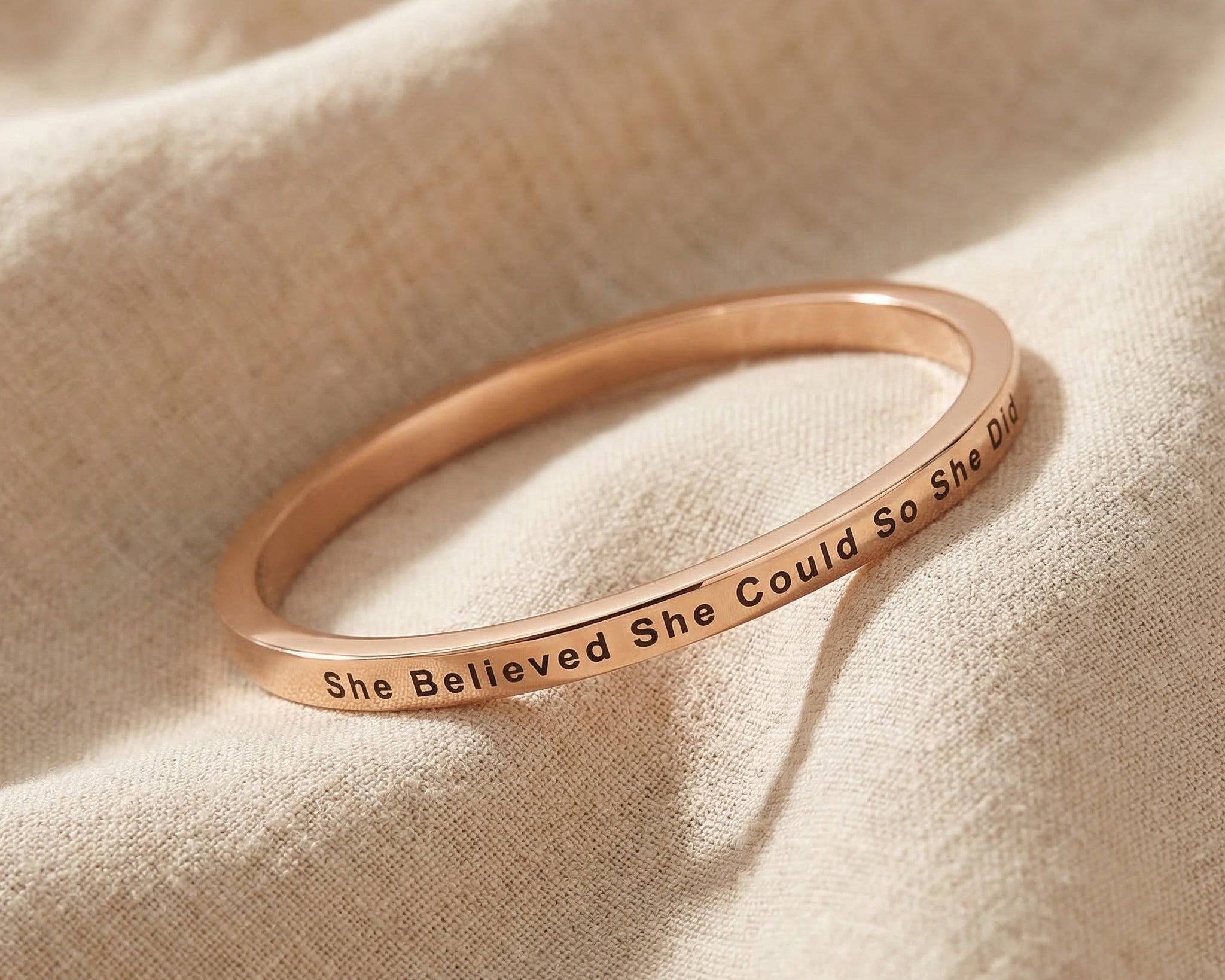 Personalised inspirational bangle in rose gold with engraved message, refined design