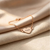 Personalised heart bracelet in rose gold with engraved name, elegant keepsake design