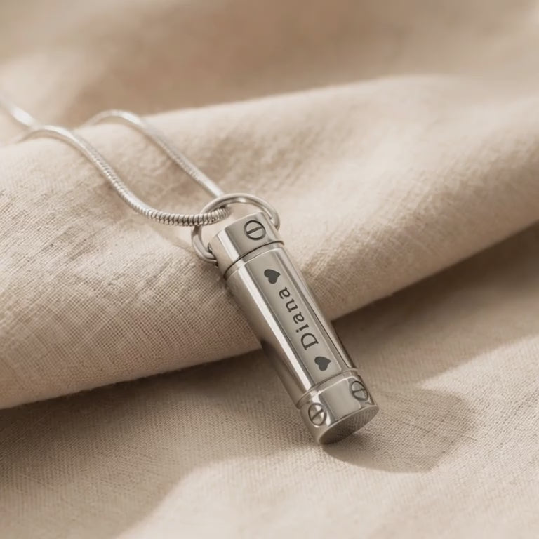 Product video showing cylinder cremation necklace with urn pendant for memorial ashes