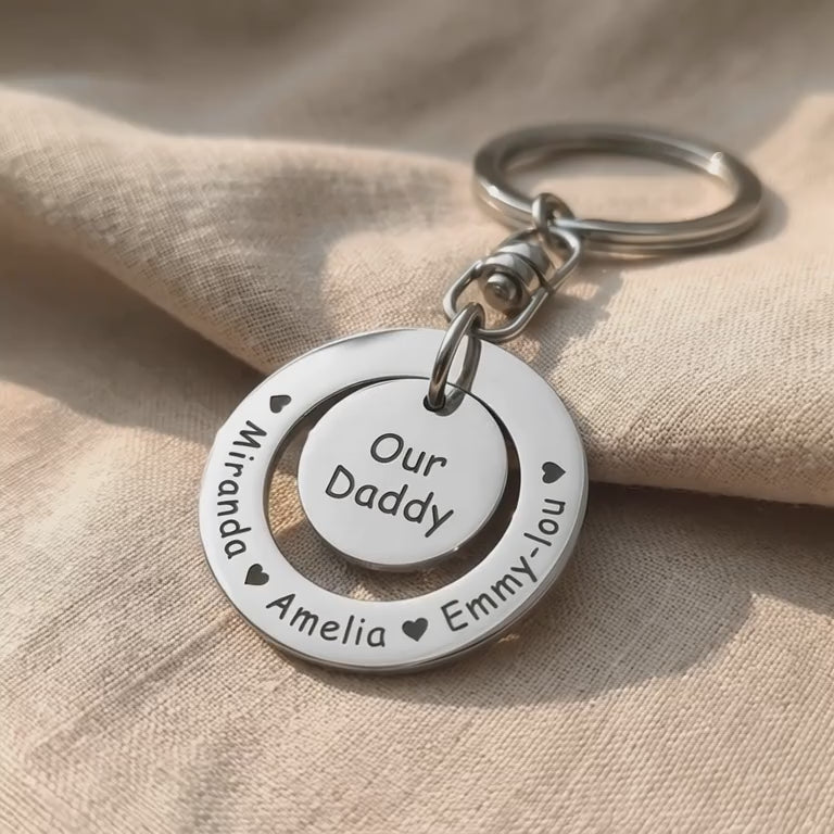 Washer Disc Keyring with engraved message shown in close-up product view