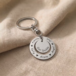 Washer Disc Keyring with engraved message shown in close-up product view