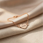 Video showing personalised heart bracelet with engraved name and polished finish detail