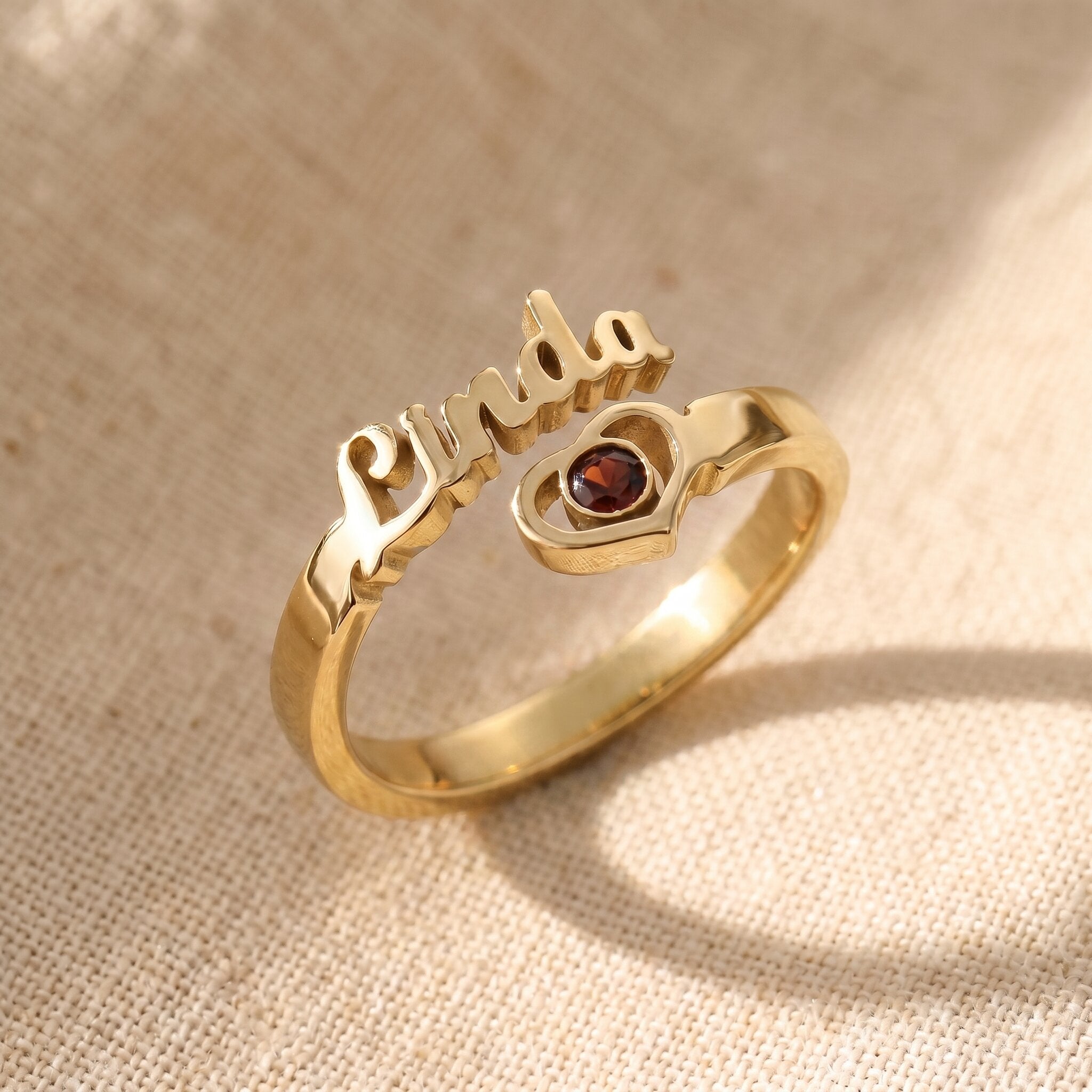Single name ring in gold with custom engraved name and birthstone, elegant jewellery gift