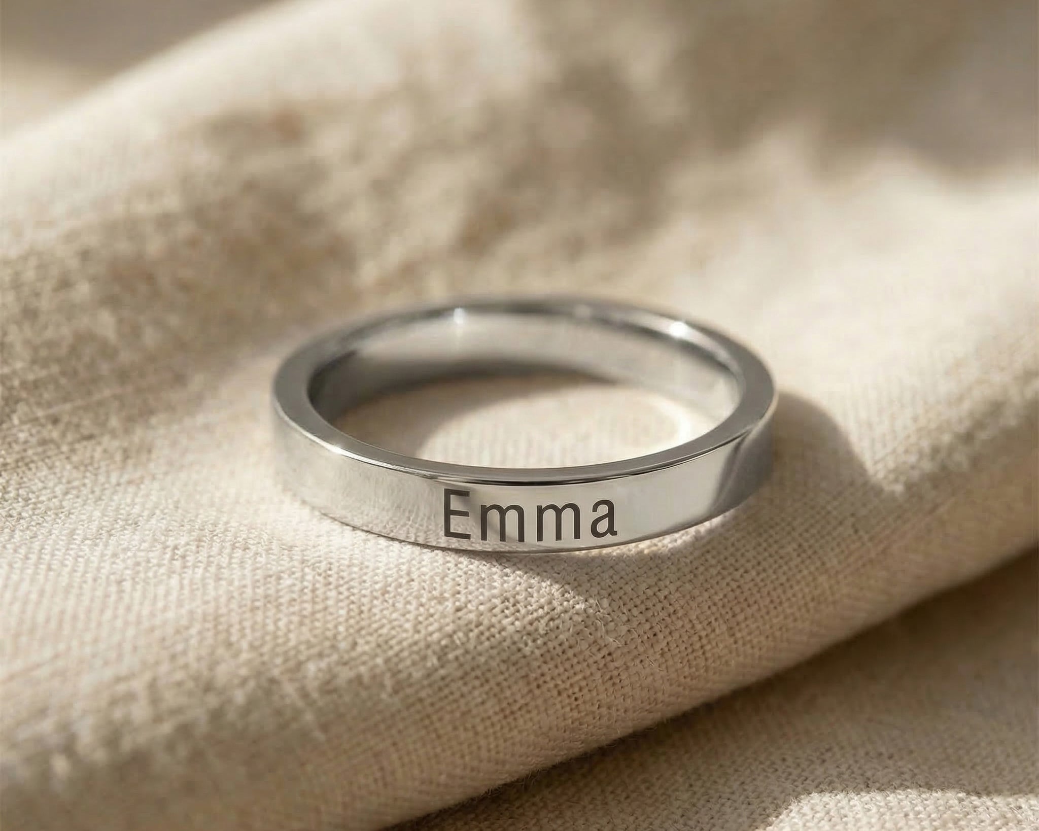 Personalised stackable ring in silver with engraved name, simple and elegant style