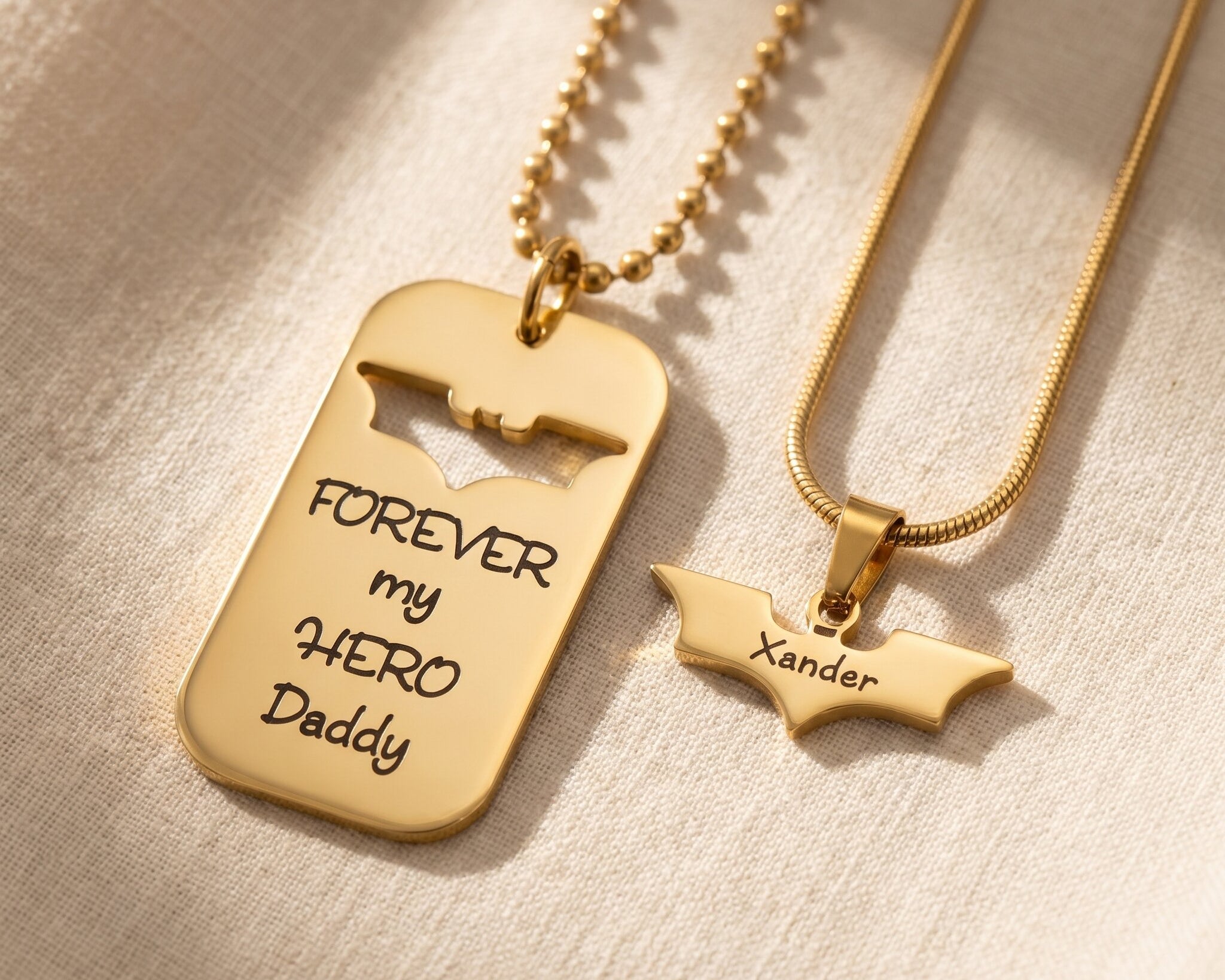 Matching father and son dog tag necklace with bat cutout pendant, personalised superhero keepsake gift
