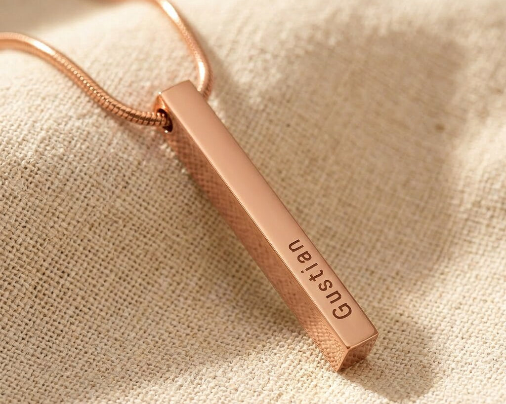 Rose gold vertical bar necklace with engraved bar pendant on delicate chain