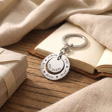 Washer Disc Keyring placed on table with engraved disc, perfect keepsake gift for father or teacher