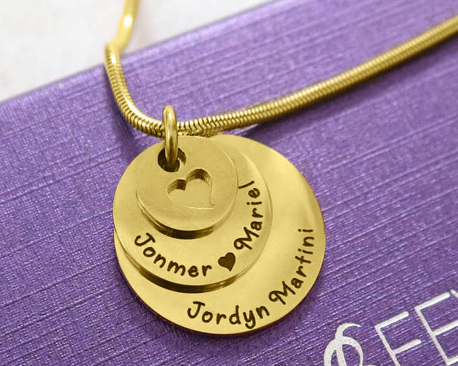Close-up of gold Tower of Love necklace with layered round charms, design by Belle Fever Jewellery
